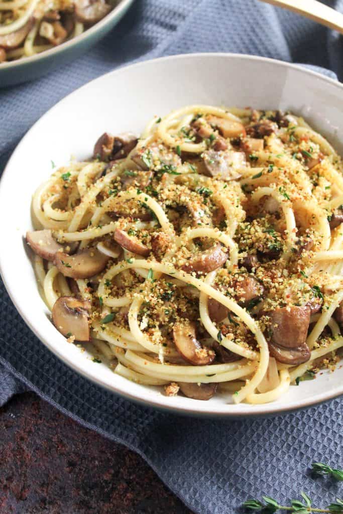 Vegan Garlic Mushroom Spaghetti topped with herby breadcrumbs