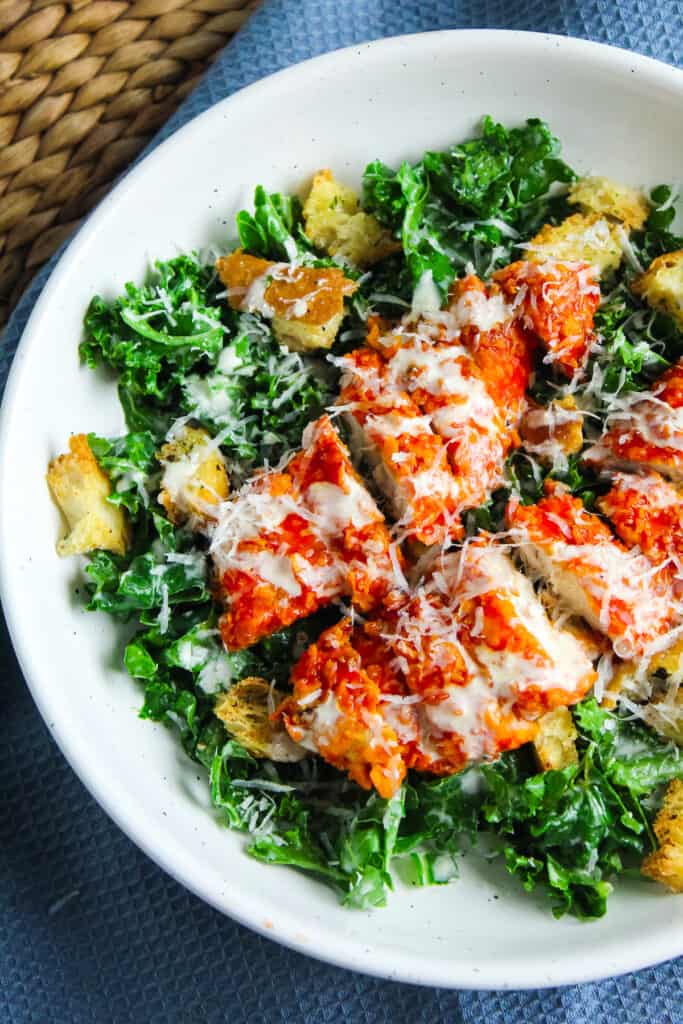 Overview of Buffalo Chicken Caesar Salad with Kale. 