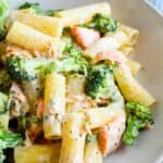 Rigatoni pasta with salmon, broccoli and a cream cheese sauce.