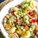 Pasta salad with cucumber, tomato, and feta cheese.