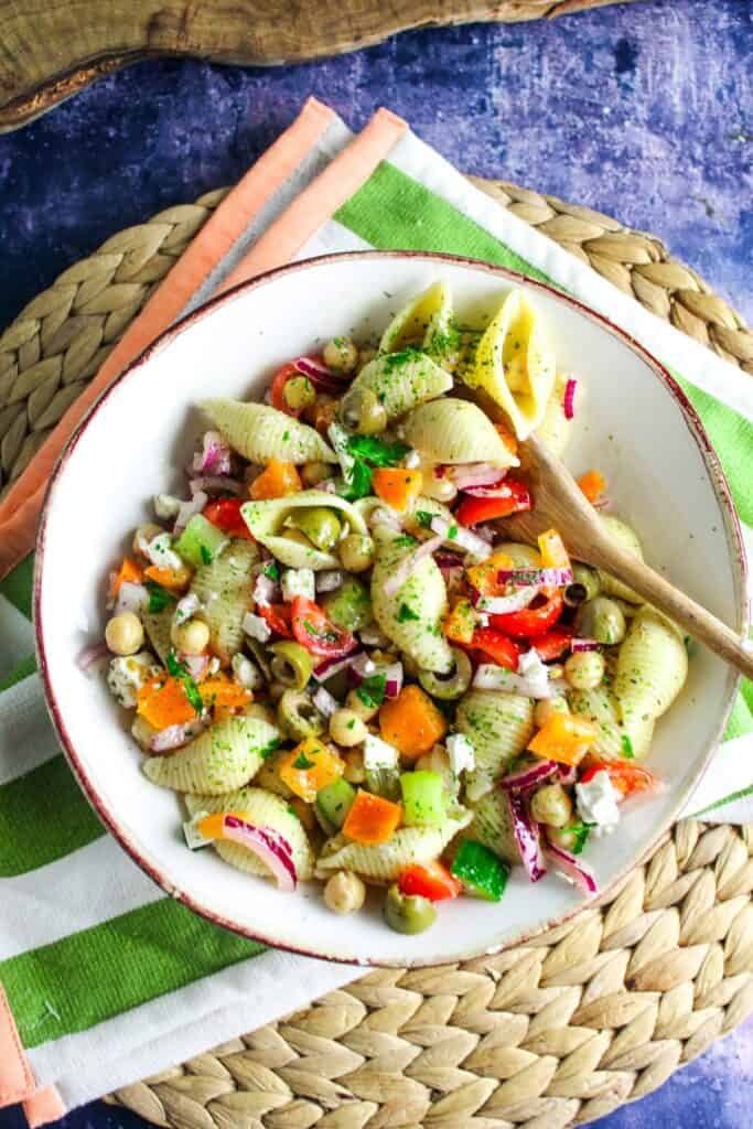 Pasta salad with chickpeas, cucumbers, and feta cheese.