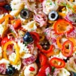 fresh Italian pasta salad with colorful vegetables, olives, and herbs - Carries Kitchen recipe