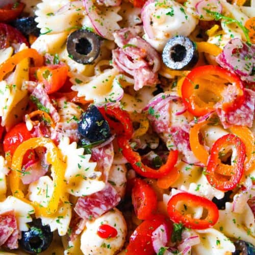 fresh Italian pasta salad with colorful vegetables, olives, and herbs - Carries Kitchen recipe