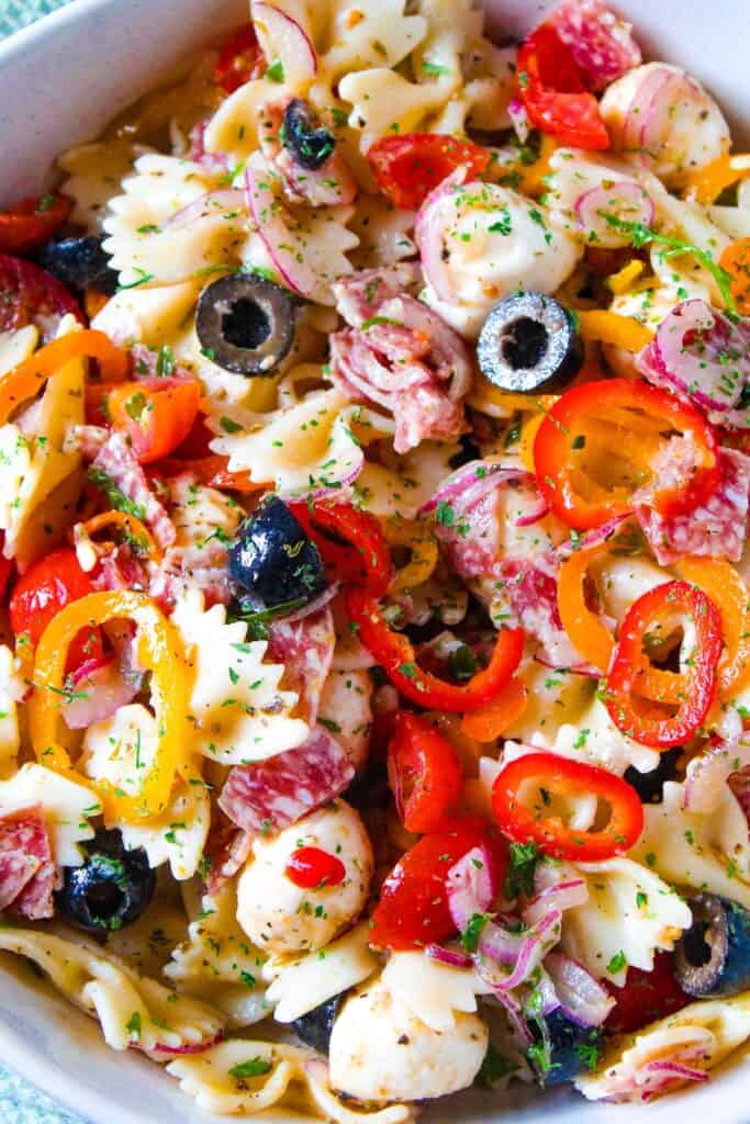 fresh Italian pasta salad with colorful vegetables, olives, and herbs - Carries Kitchen recipe