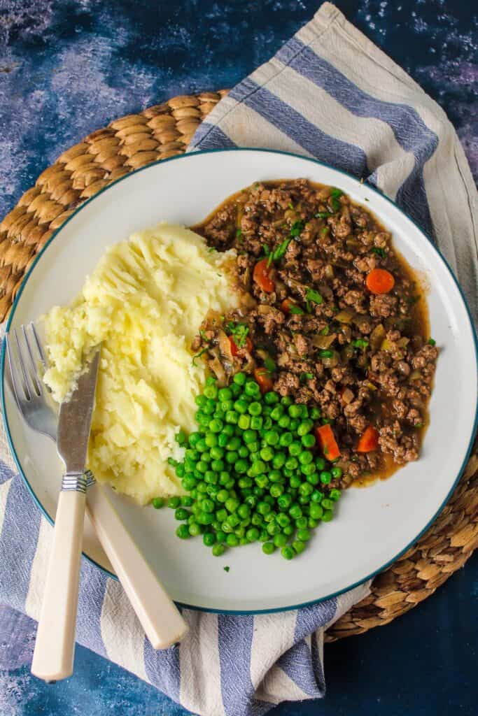 Traditional Scottish savoury mince with mashed potato and peas.